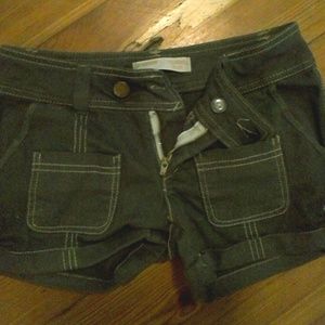 Army green shorts.